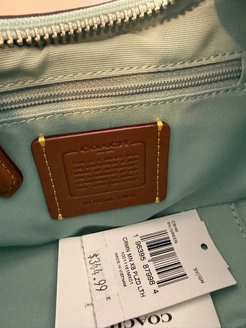 Coach Light Blue Quilted Leather Crossbody Bag with Tassel